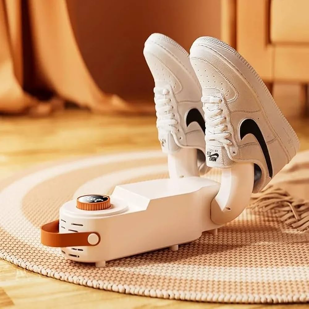 Sneakers drying on the shoe dryer