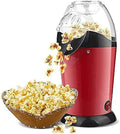 Hot air popcorn maker with a bowl of popcorn