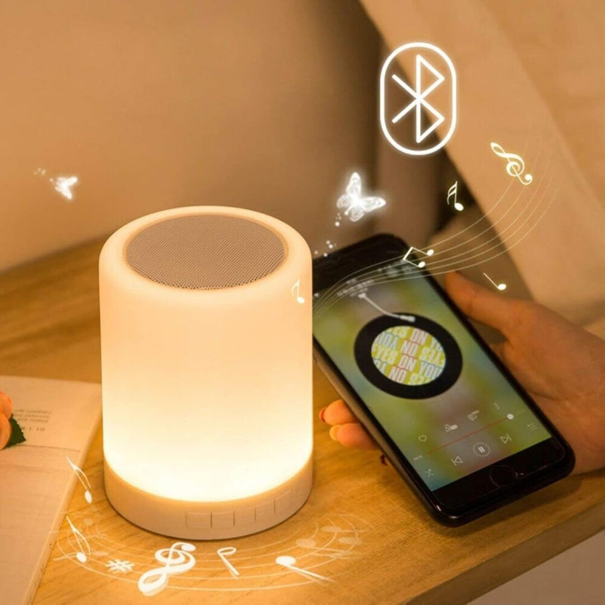 Touch lamp Bluetooth speaker on a bedside table