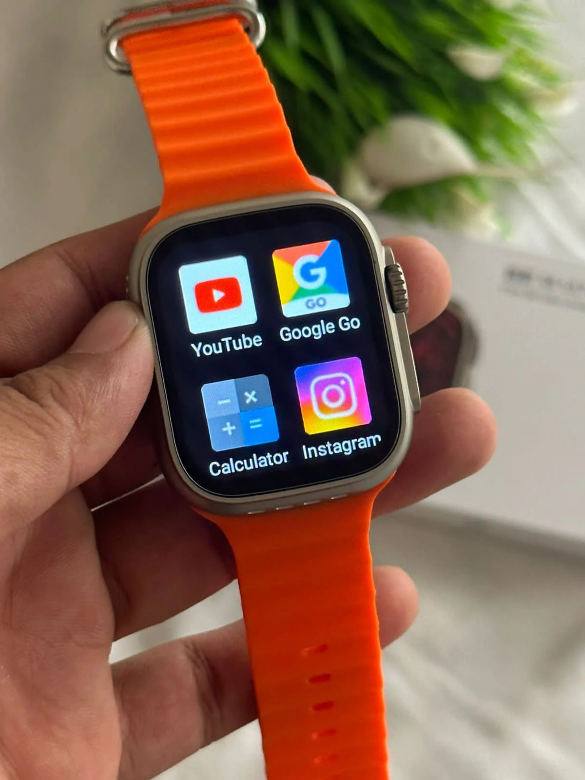 Smartwatch running apps in hand