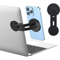 Magnetic phone mount attached to laptop screen
